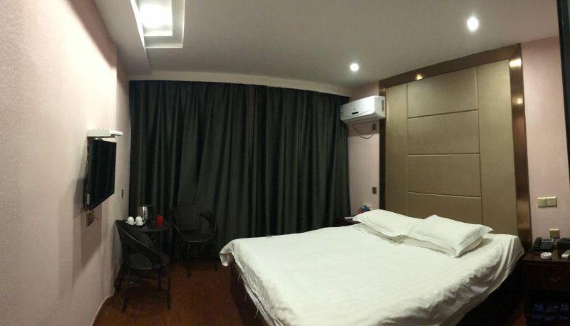 Habitación - Haotai Business Hotel