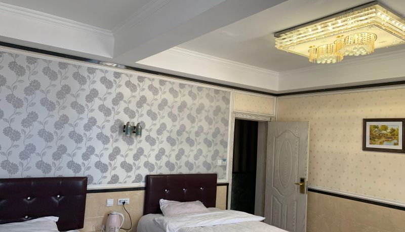 Chambre - White Pigeon Business Hotel