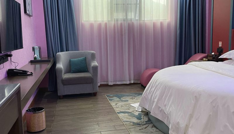 Zimmer - Ziyun Ethnic Hotel