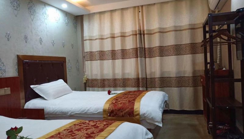 Zimmer - Longxing Business Hotel