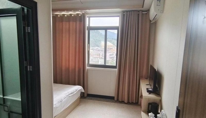 Zimmer - Shengchengju Hotel (Longsheng Store)