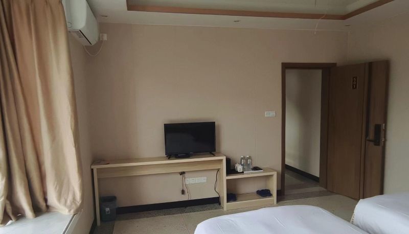 Zimmer - Shengchengju Hotel (Longsheng Store)