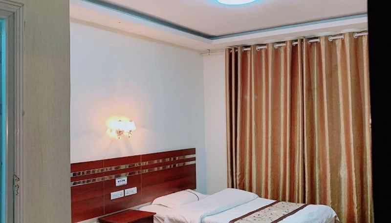Habitación - Yixuan Business Hotel