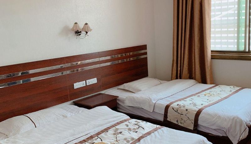 Habitación - Yixuan Business Hotel