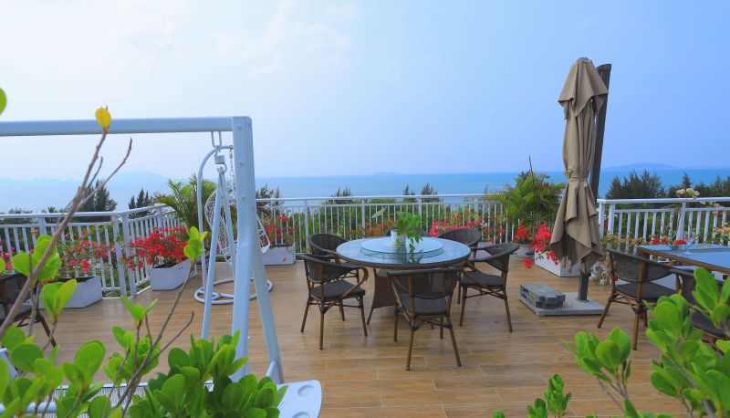 Area esterna dell'hotel - Sanya Coconut Lodge · Sea View Resort Homestay (Sanya Bay Store)