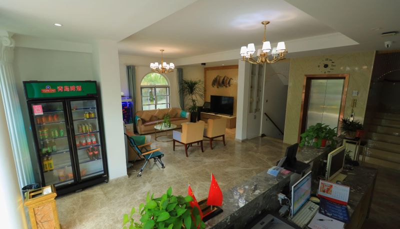 Area esterna dell'hotel - Sanya Coconut Lodge · Sea View Resort Homestay (Sanya Bay Store)