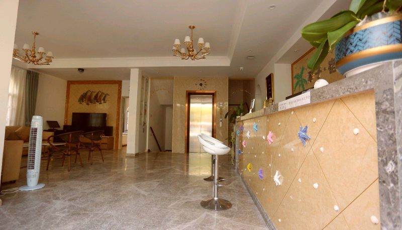 Area esterna dell'hotel - Sanya Coconut Lodge · Sea View Resort Homestay (Sanya Bay Store)