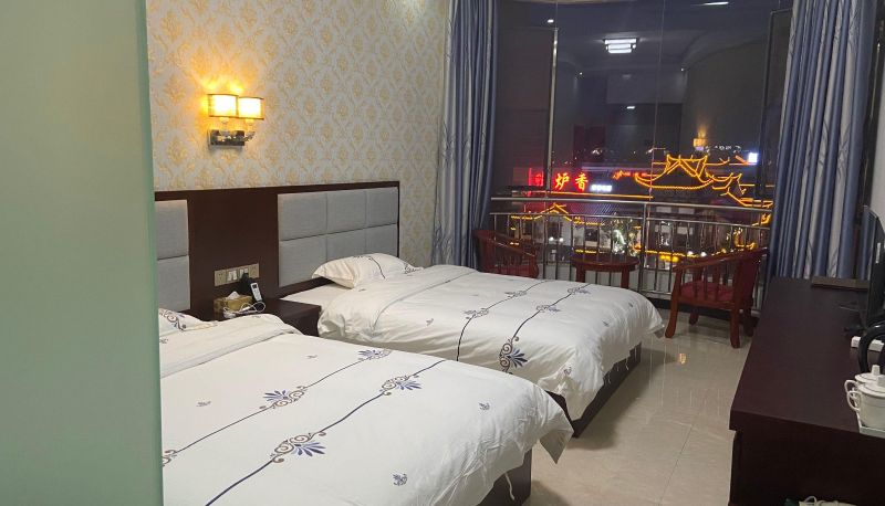Habitación con balcón - Minshun Hotel