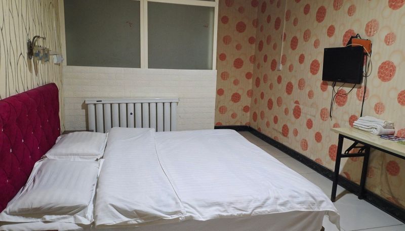 Zimmer - Yiming Hotel (West Gate Branch of Foreign Studies University)