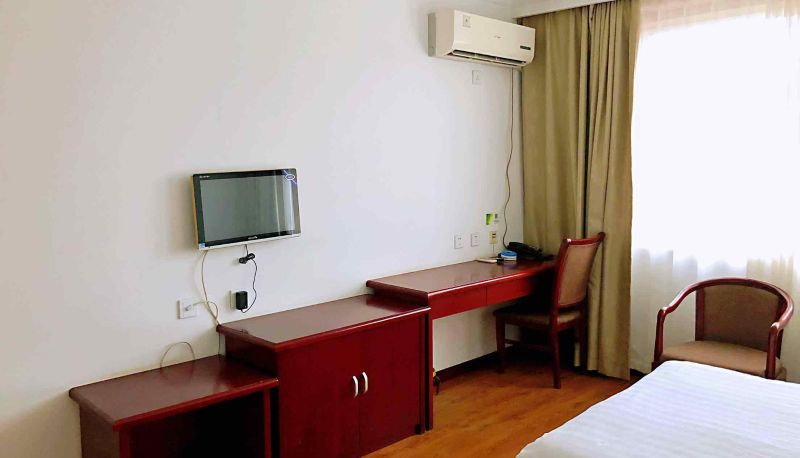 Zimmer - Huayue Hotel (Xinghai South Road Branch)