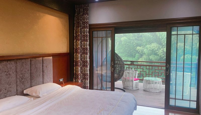 Zimmer mit Meerblick - Chenjia Courtyard Peninsula Courtyard Hotel