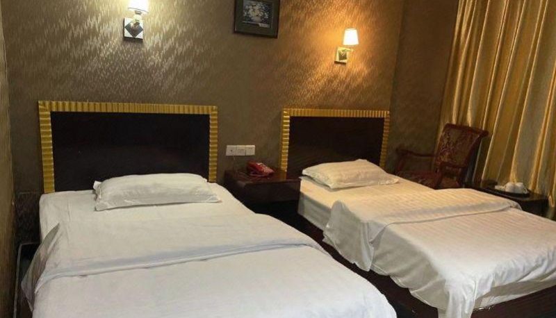 Zimmer - Kaiyue Business Hotel