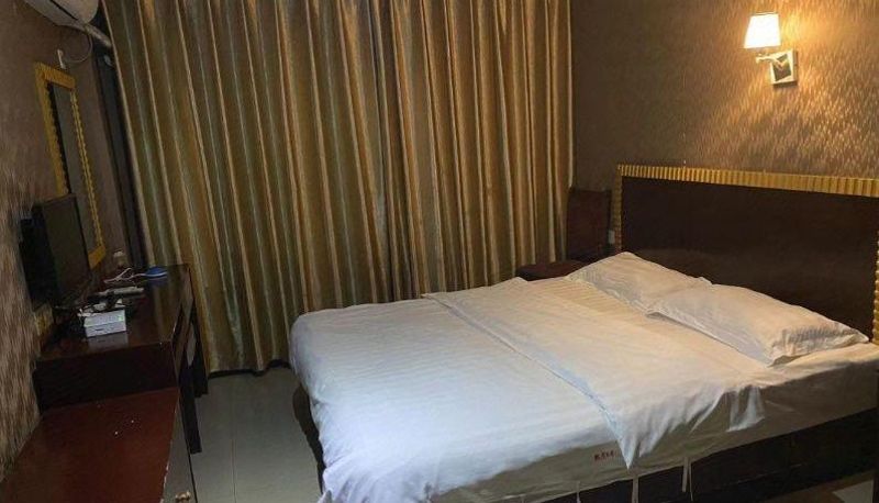 Zimmer - Kaiyue Business Hotel