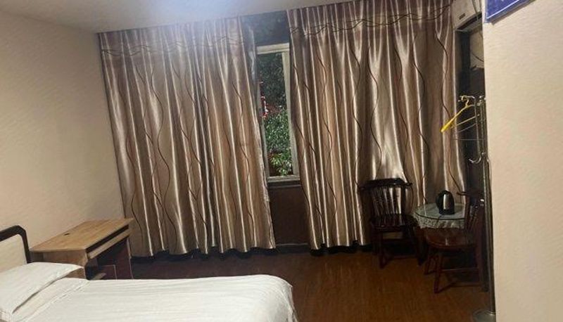 Zimmer - Xinxin Hotel (Jiangbin East Road Branch)