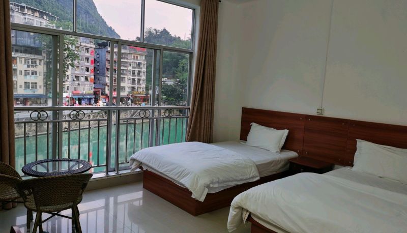 Zimmer mit Flussblick - Bama Fengyuan Hotel