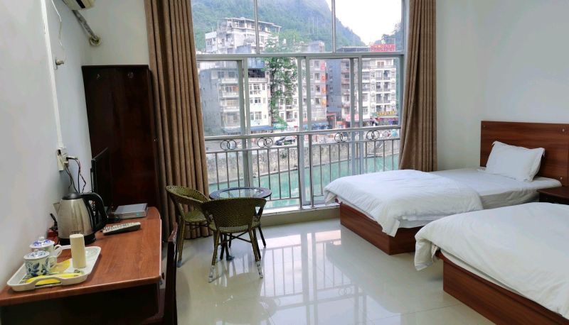 Zimmer mit Flussblick - Bama Fengyuan Hotel