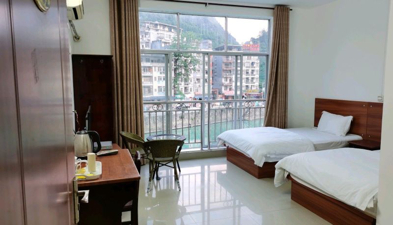 Zimmer mit Flussblick - Bama Fengyuan Hotel