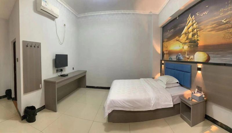 Zimmer - Hexin Business Hotel (Rongxian Chengnan Station Branch)