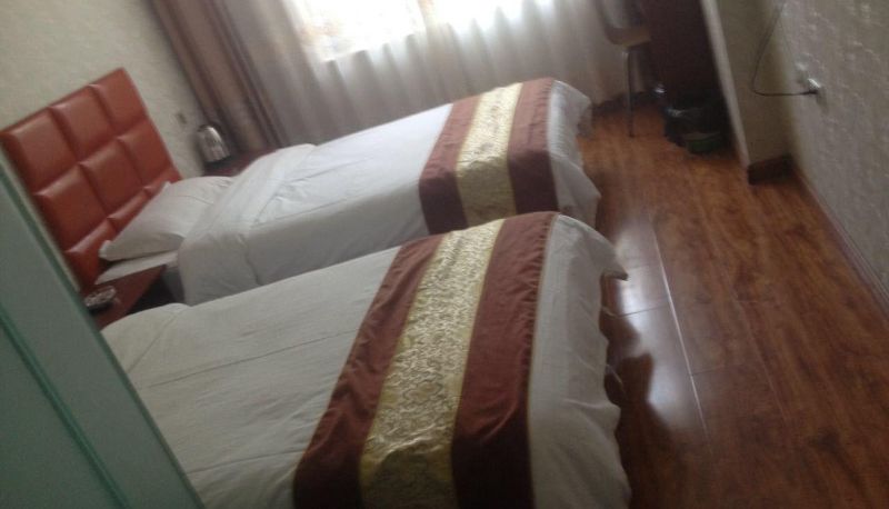 Habitación - Hailong Business Hotel