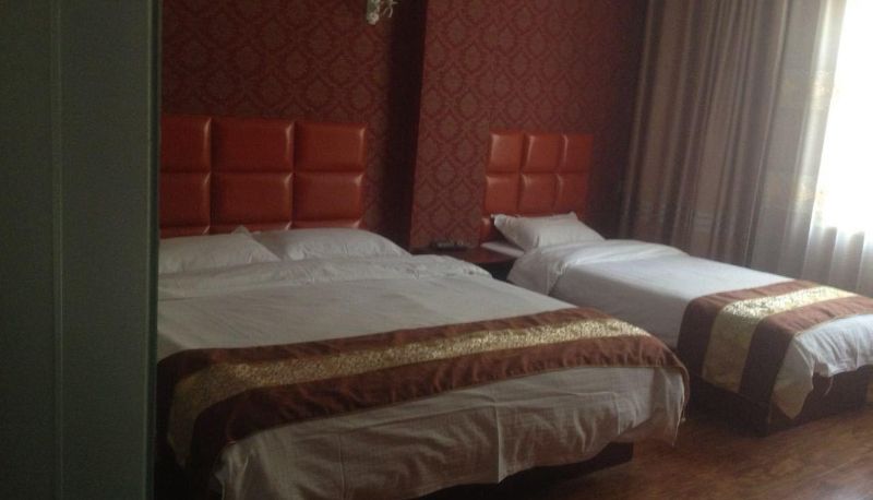 Habitación - Hailong Business Hotel