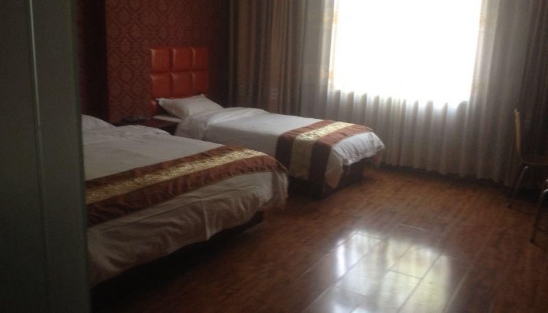 Habitación - Hailong Business Hotel