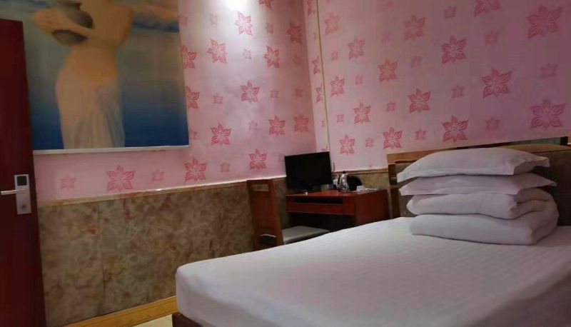 Habitación - Baiyun Hotel (Passenger East Gate Station Store)