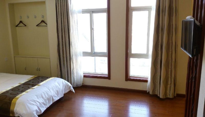 Zimmer - Longshan Business Hotel