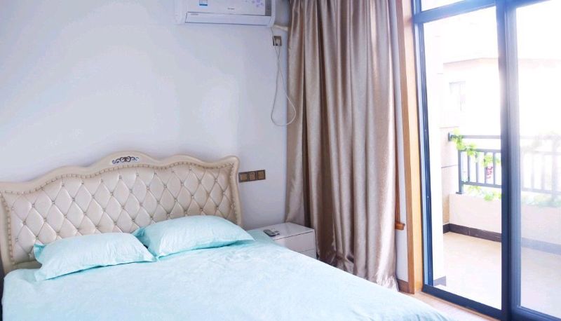 Kamer met balkon - Yuening Hotel