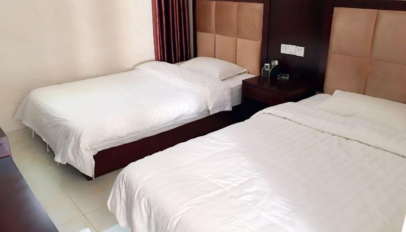 Zimmer - Yalong Business Hotel