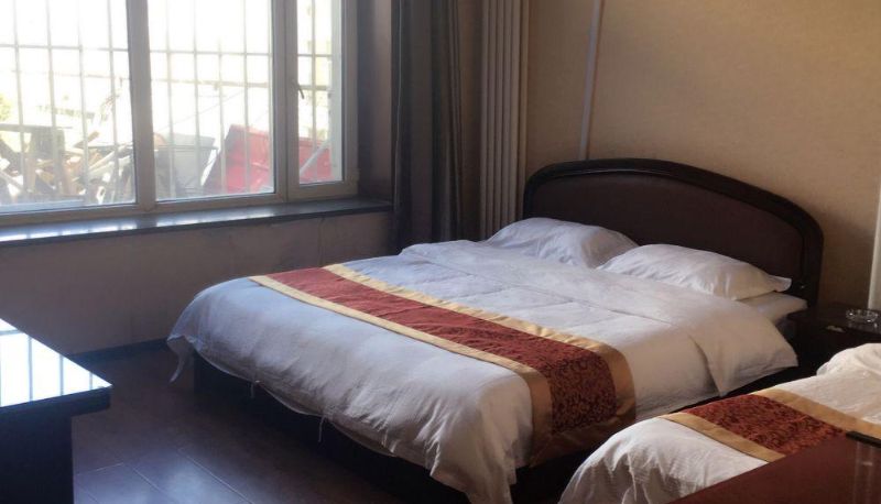 Zimmer - Binjiang Hotel (Changjiang Road Branch)