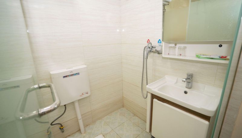 Zimmer - Xinguiyuan Comprehensive Business Hotel (Xujiapeng Subway Station E Exit Store)