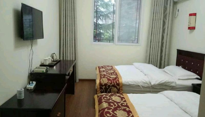 Zimmer - Xixing Business Hotel (Ludingqiao Scenic Area Branch)