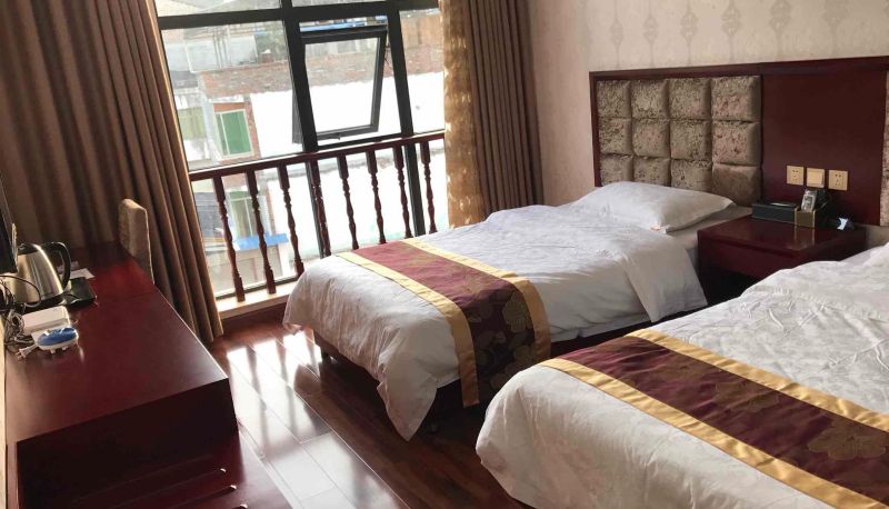 Zimmer - Guangyuan Mingchenggen Hotel