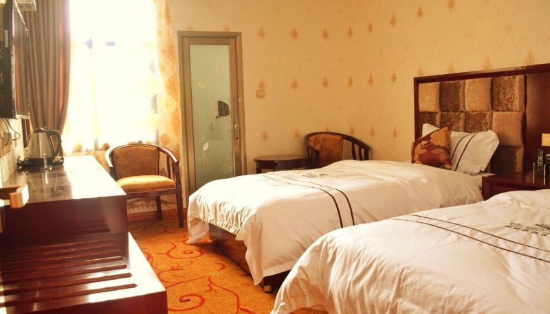 Zimmer - Guangyuan Mingchenggen Hotel
