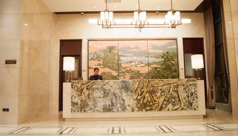 Zewnętrzna część hotelu - Colorful Guizhou Hotel (Huaxi University City Branch)