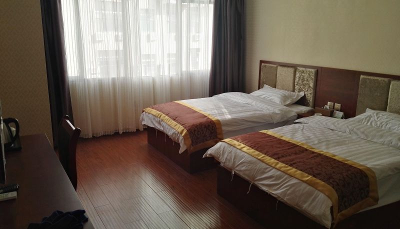 Chambre - Xintian Business Hotel