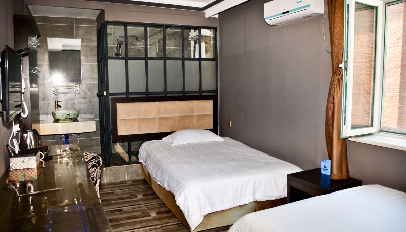 Zimmer - Dunhua Pingguo Holiday Hotel
