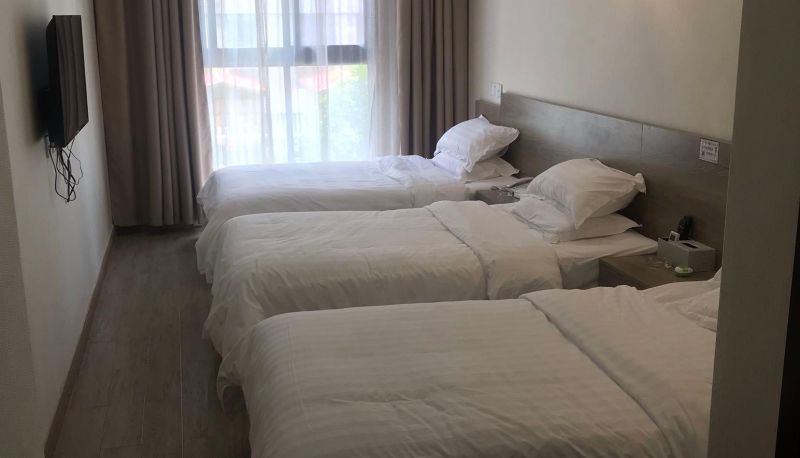 Zimmer - One Plus One Business Hotel