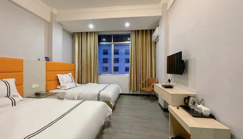 Business-Zimmer - Meigang Business Hotel (West Bus Station Store)