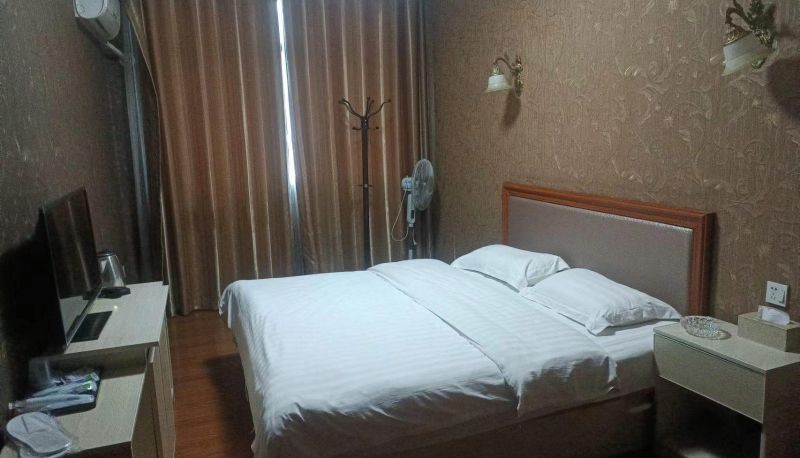 Zimmer - Xingyi Pengxiang Hotel