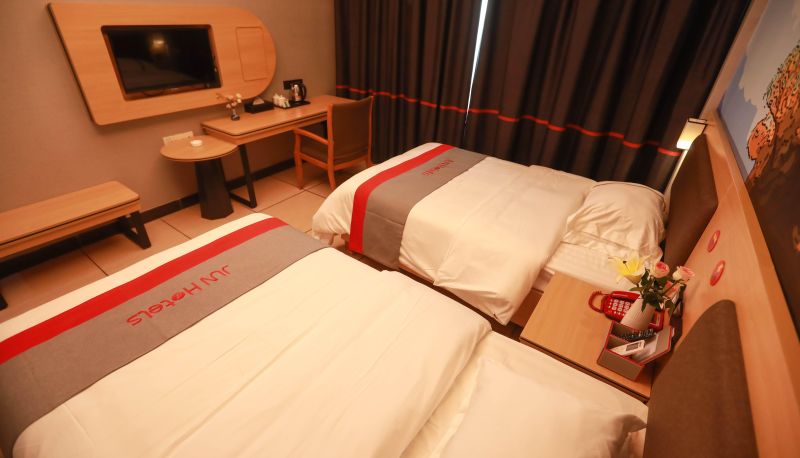 Zimmer - Junyi Chain Hotel (Maoming Xinyi Xinshang Road Branch)