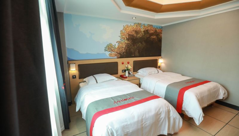 Zimmer - Junyi Chain Hotel (Maoming Xinyi Xinshang Road Branch)