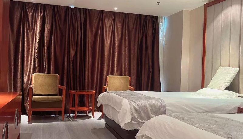 Zimmer - New Bao Luo Hotel (Changxing Haixing Road Branch)