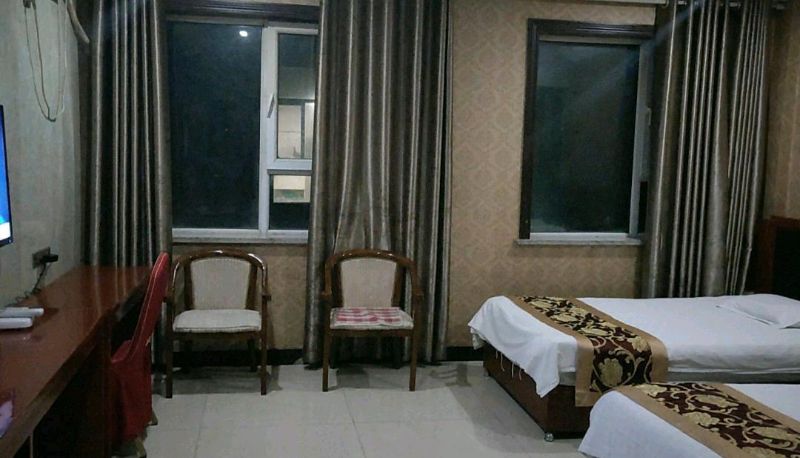 Zimmer - Hexin Business Hotel