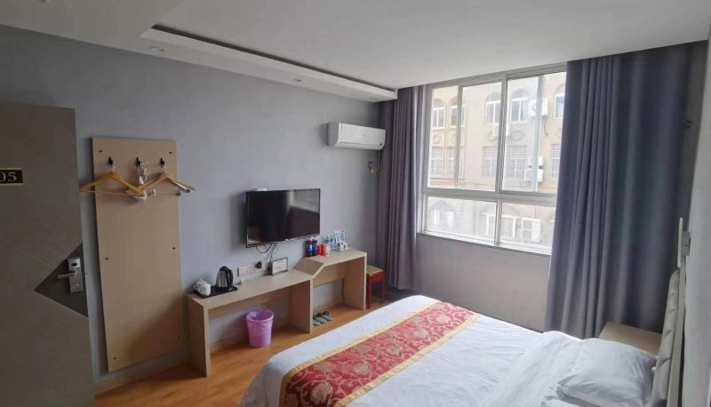 Habitación corporativa - Happy Holiday Hotel