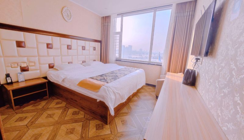 Zimmer mit Flussblick - Burhatong Business Hotel