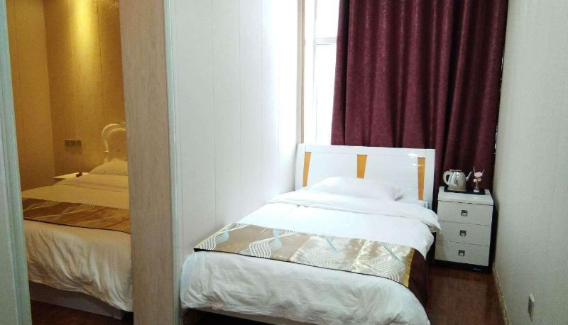 Camera per famiglia - Yangtai Business Hotel