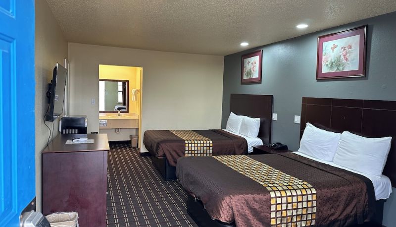 Bilgi - Executive Inn & Suites