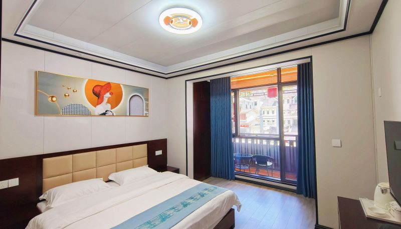 Zimmer mit Balkon - Huifu Holiday Inn