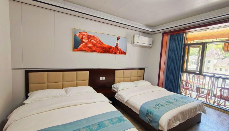 Zimmer mit Balkon - Huifu Holiday Inn